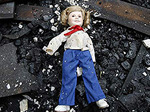 REAL FIREPROOF DOLL... OR PLACED AFTER FIRE?